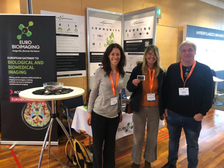 Euro-BioImaging booth at EMIM 2023, featuring Erika Cerutti (left) and Giuseppe Digilio (right)